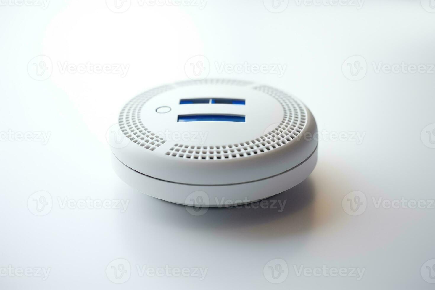 Carbon monoxide detector isolated on a white background photo