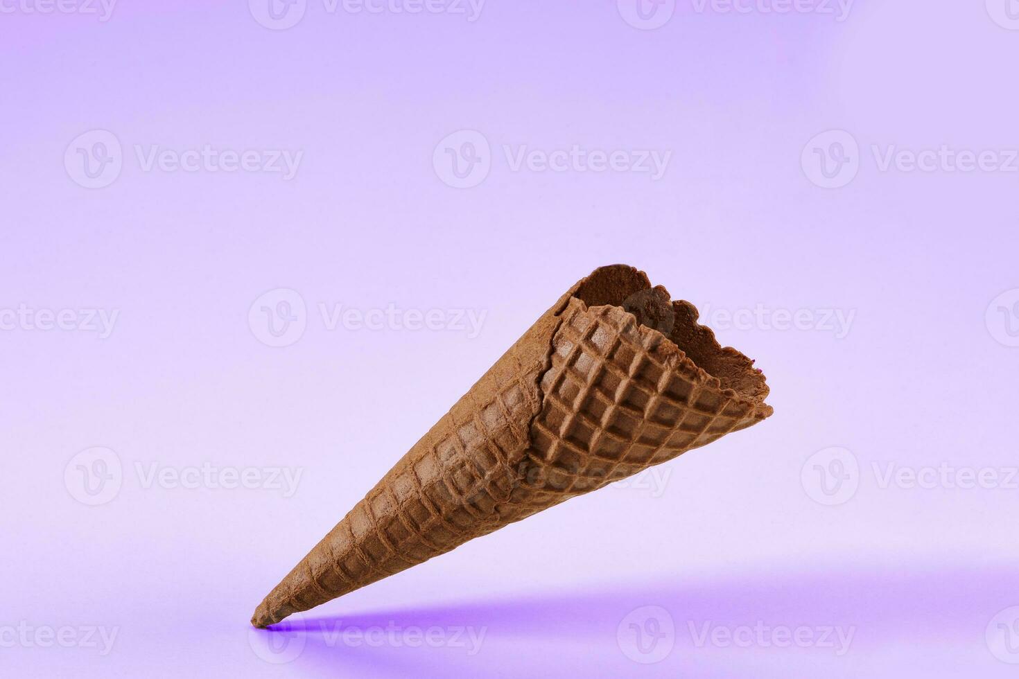 Empty. crispy, chocolate wafer cone for ice cream.  treats. template for advertising and design. photo