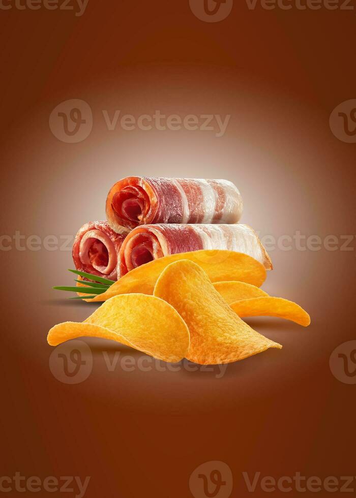 Slices of rolled bacon with chips or crisps and green onion on brown background with copy space. Advertising concept. Close-up shot. photo