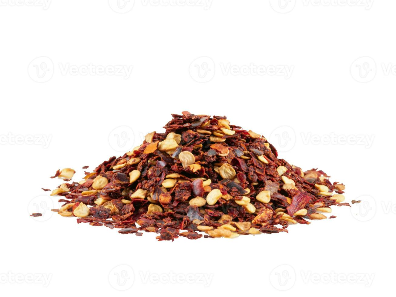 Chopped, dry chilli pepper isolated on white background with copy space for text, images. Spices and herbs. Packaging concept. Close-up, side view. photo