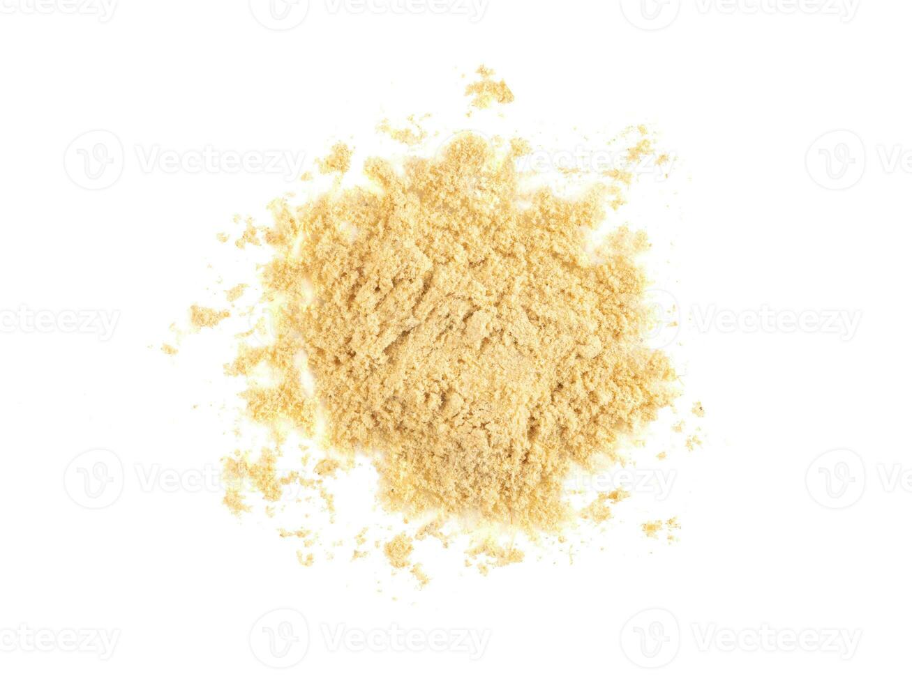 Some ground mustard isolated on white background with copy space for text, images. Spices and herbs. Packaging concept. Close-up, top view. photo