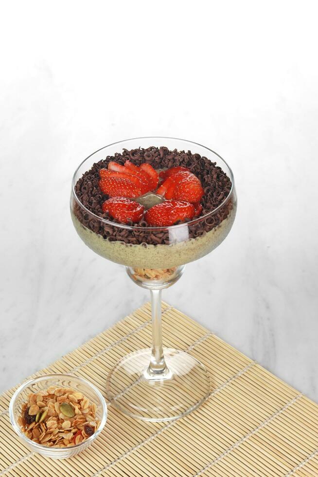 ice cream with chocolate and strawberries on a white background photo