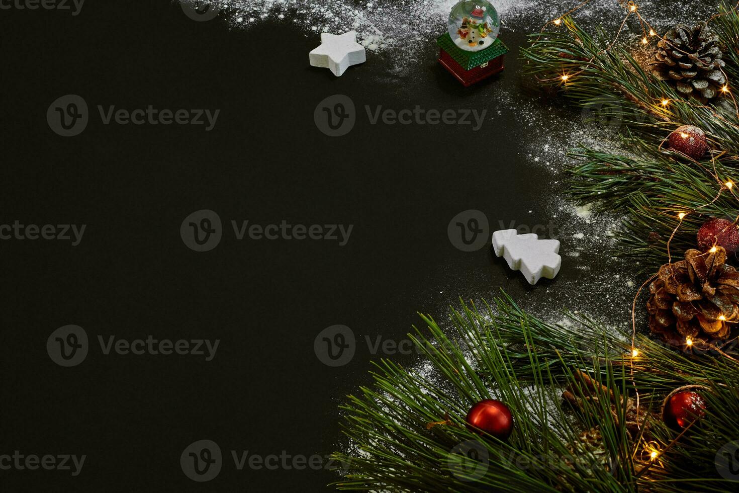 Christmas, christmas tree, colored decor, stars, balls on black background photo