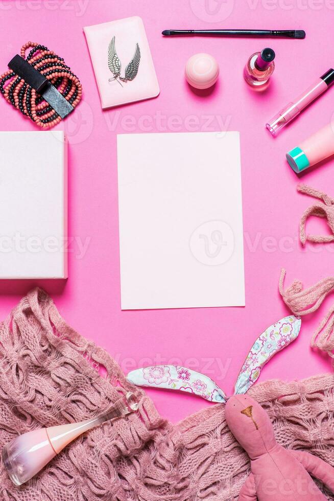 Girl's accessories on a pink background photo
