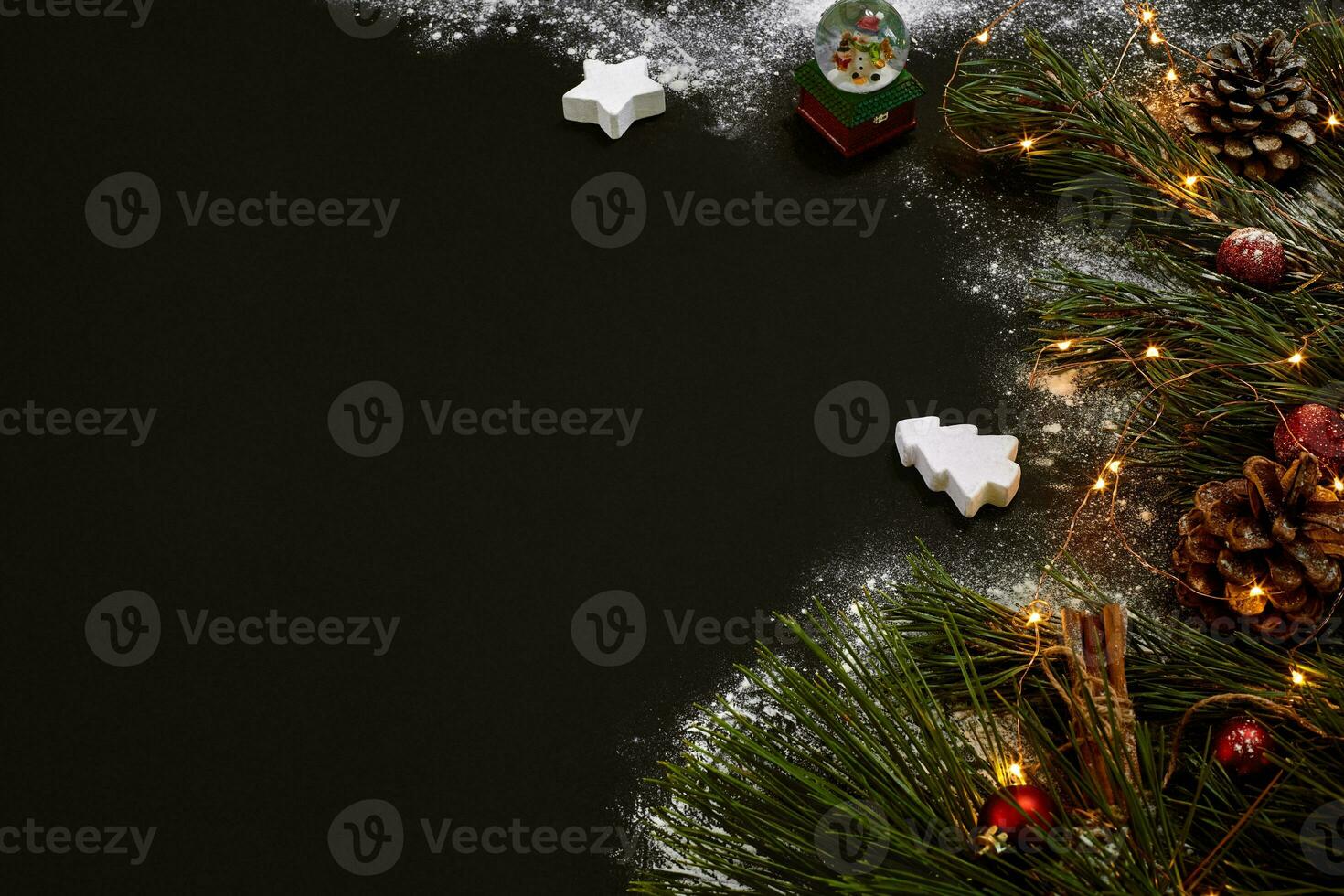 Christmas, christmas tree, colored decor, stars, balls on black background photo