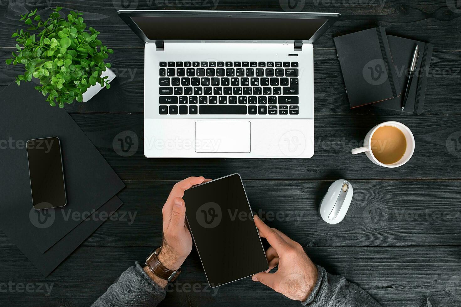 Directly above view of human hands typing on laptop. photo