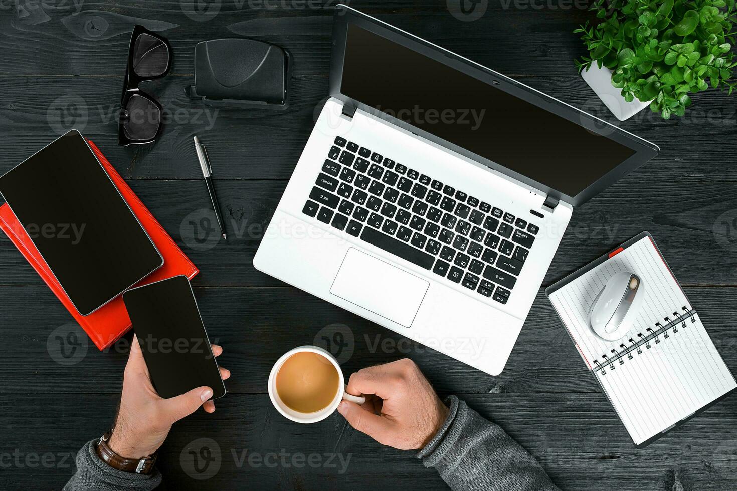Directly above view of human hands typing on laptop. photo