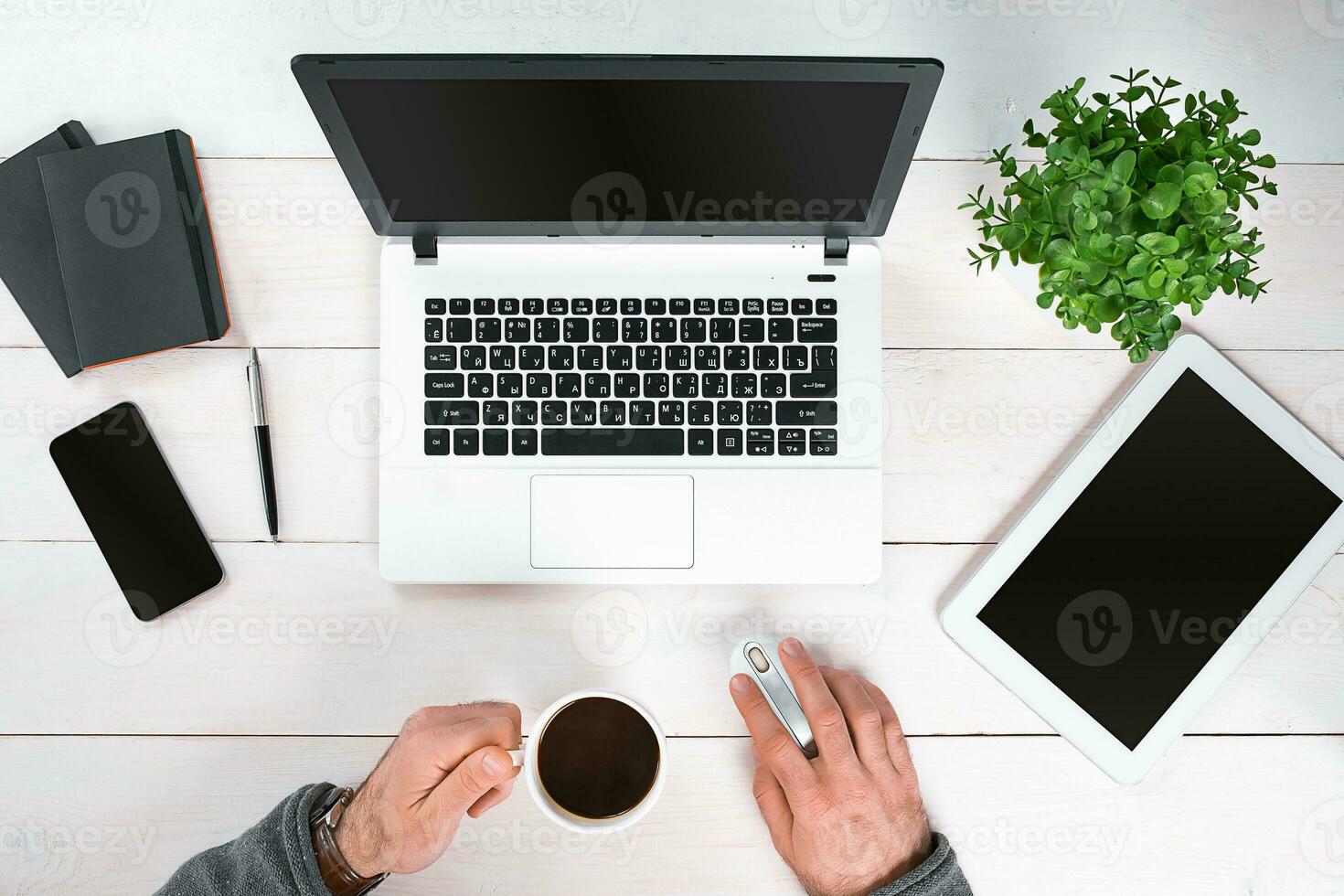 Directly above view of human hands typing on laptop. photo