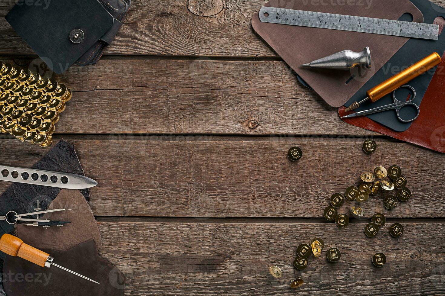 Leather handbag. Work place craftsman in a workshop. Top view photo