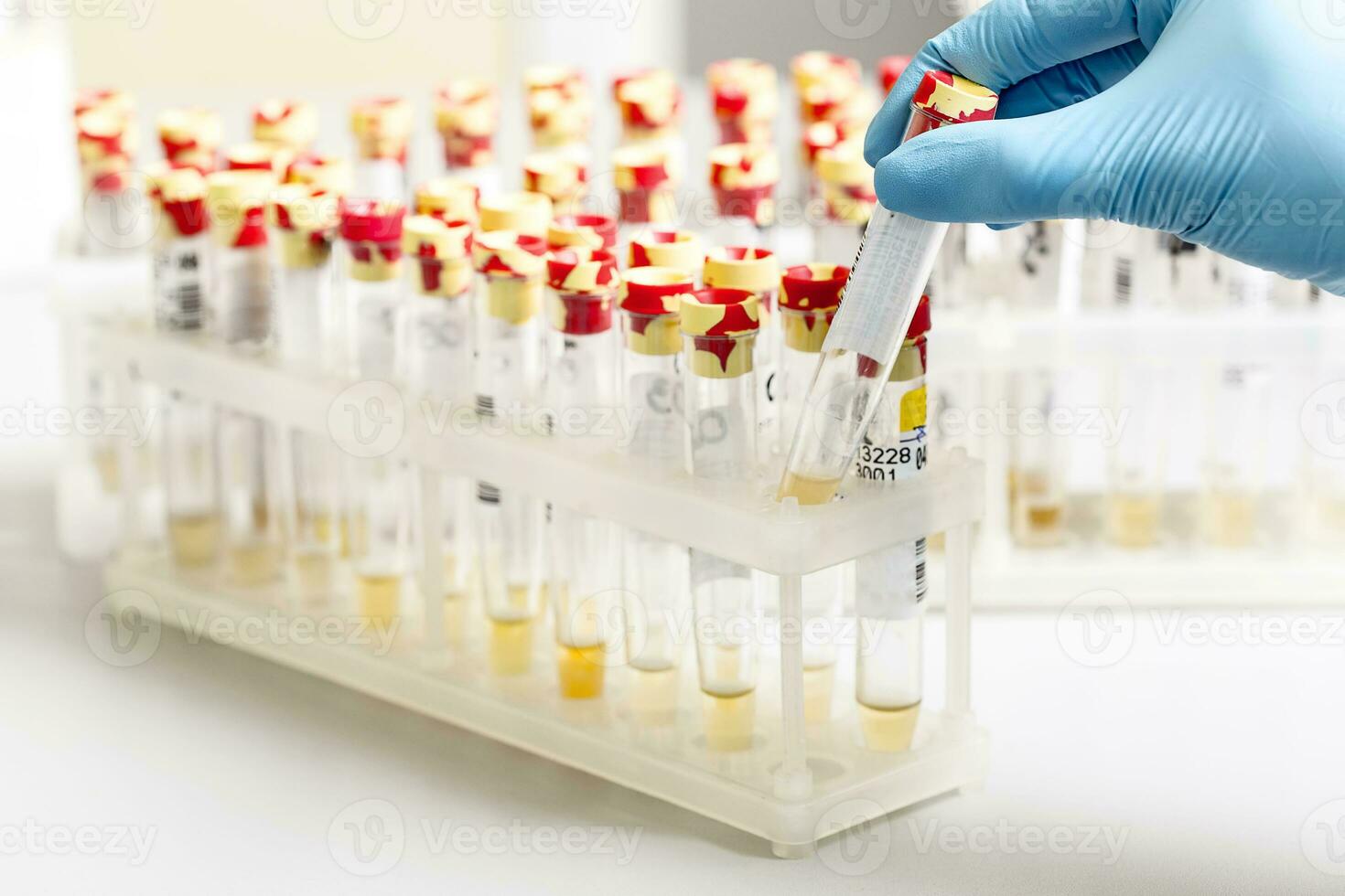 A chemical sample bottle. Centrifuge. A test tube vial sets for analysis. photo