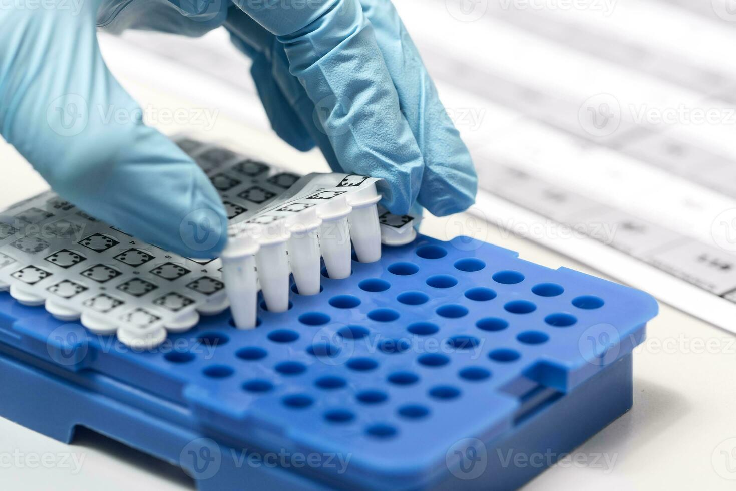 A chemical sample bottle. Centrifuge. A test tube vial sets for analysis. photo