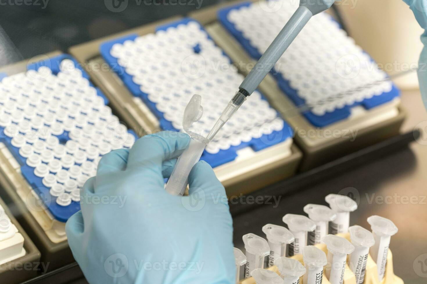 A chemical sample bottle. Centrifuge. A test tube vial sets for analysis. photo