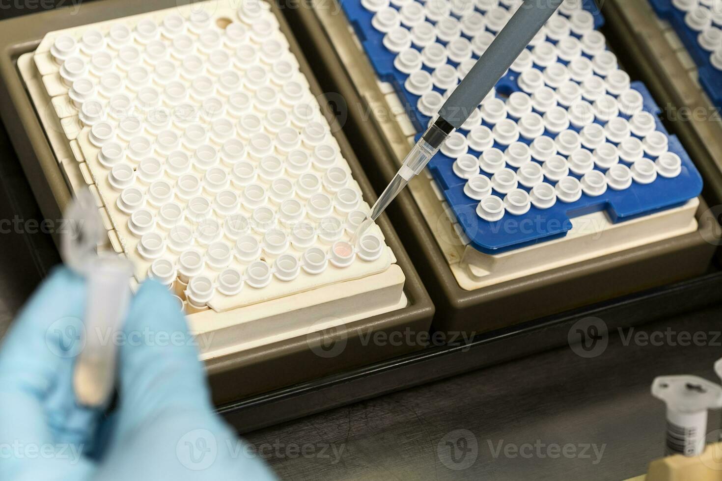 A chemical sample bottle. Centrifuge. A test tube vial sets for analysis. photo