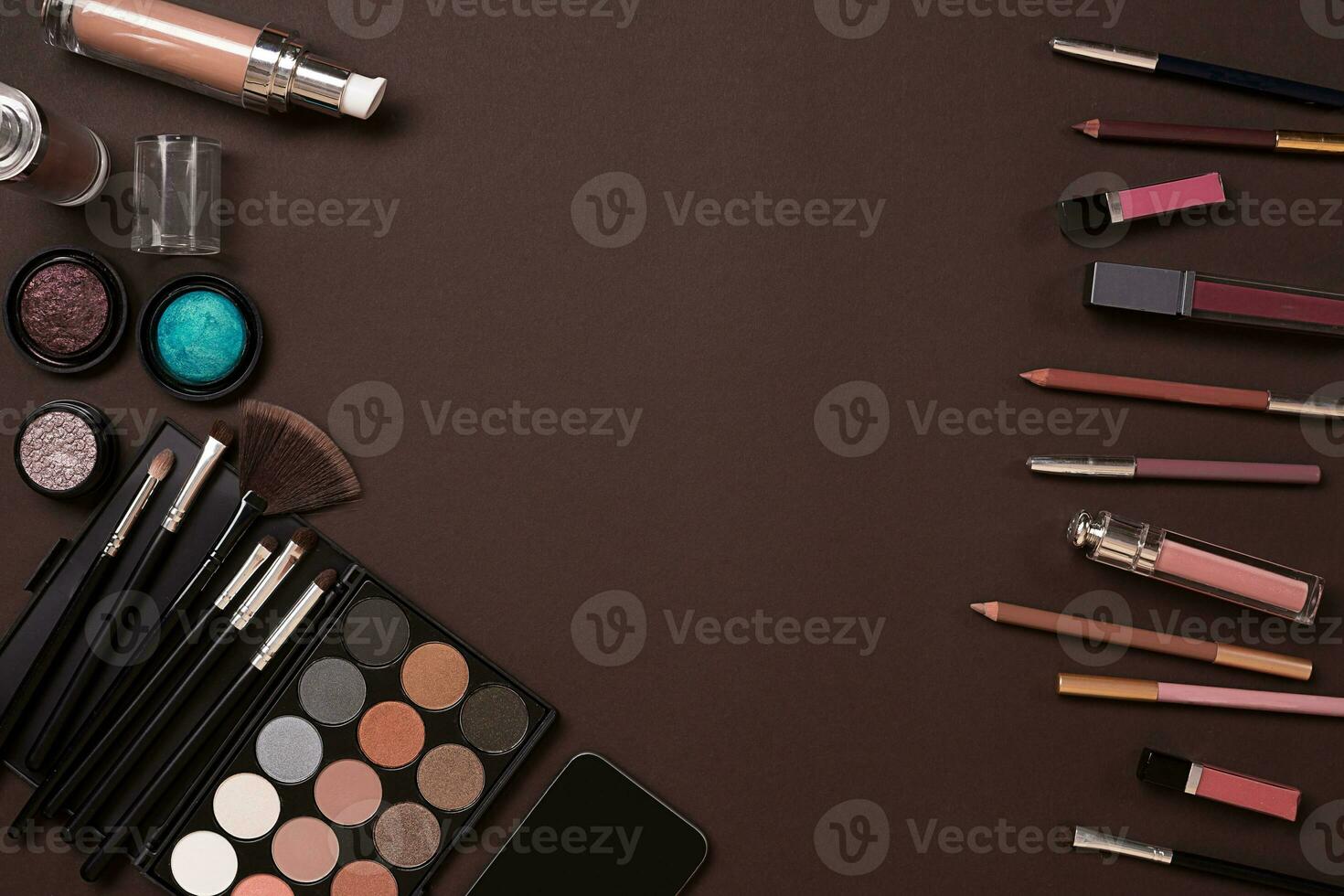 The women's cosmetics set on a brown background, modern woman. photo