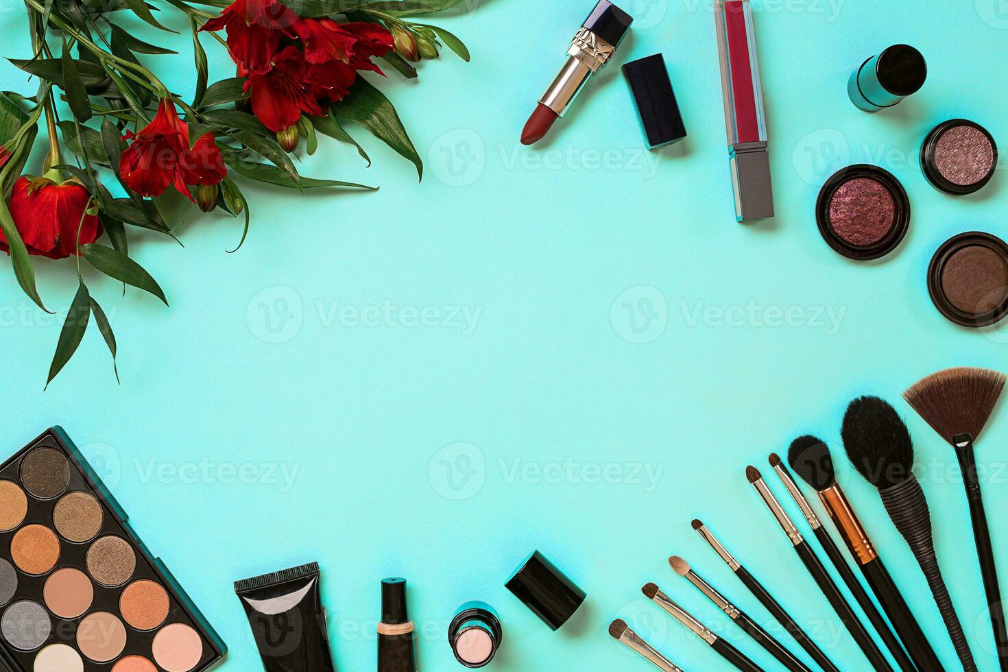 The women's cosmetics set on a blue background, modern woman. photo