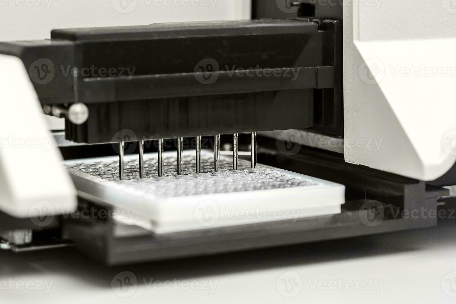 A chemical sample bottle. Centrifuge. A test tube vial sets for analysis. photo