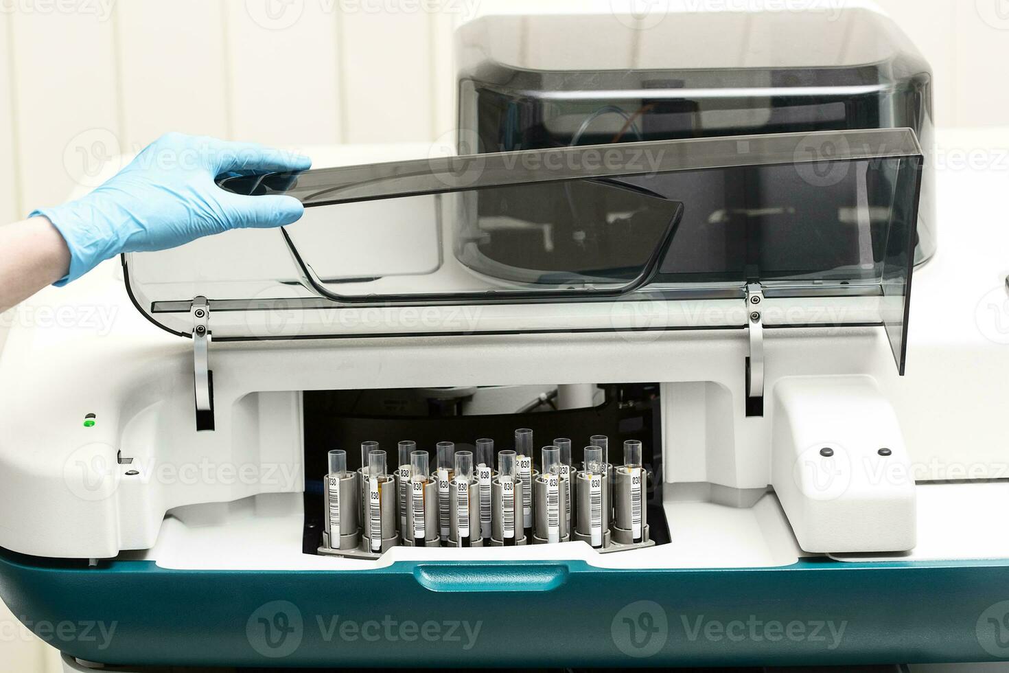 A chemical sample bottle. Centrifuge. A test tube vial sets for analysis. photo