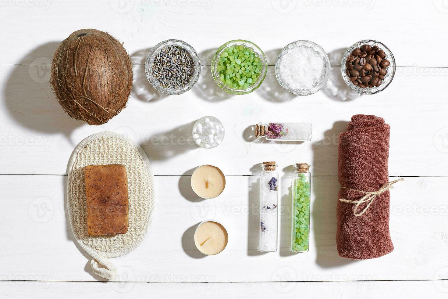 Composition of spa treatment on white wooden table with space for text. Top view photo