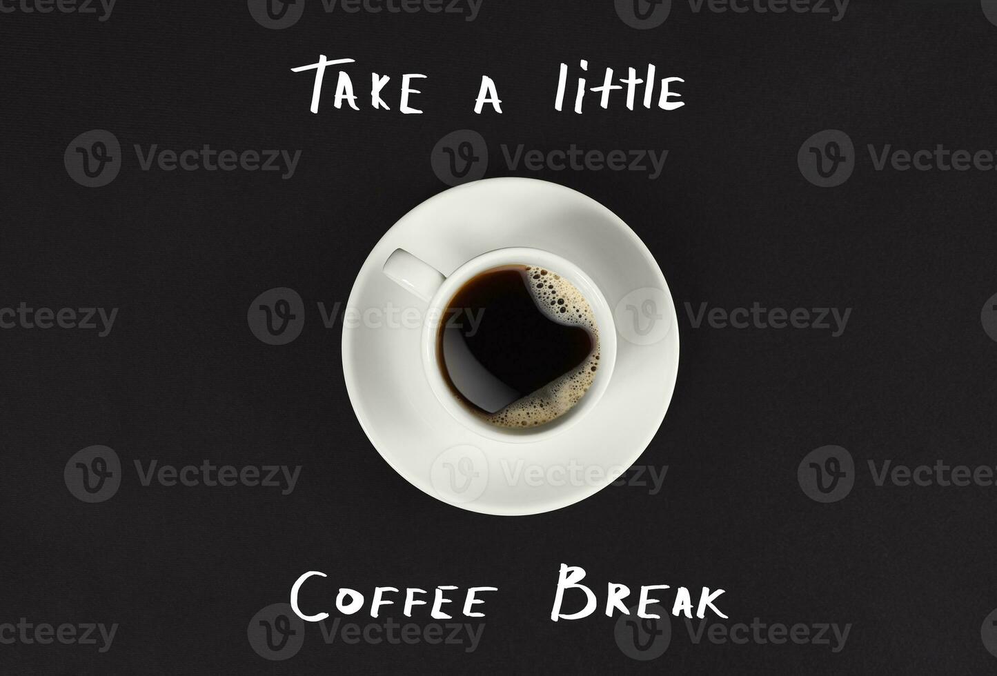 Top view of cup of black coffee and Take a little coffee break lettering isolated on black background photo