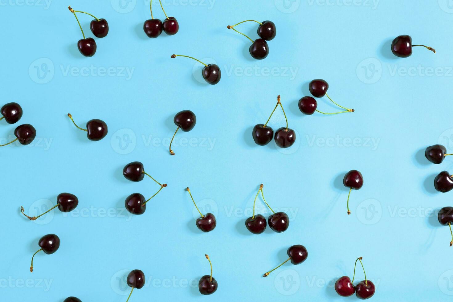 Colourful bright pattern with ripe cherry. Top view. photo