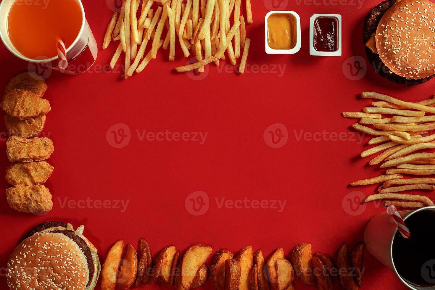 Burger and Chips. Hamburger and french fries in red paper box. Fast food on red background. photo