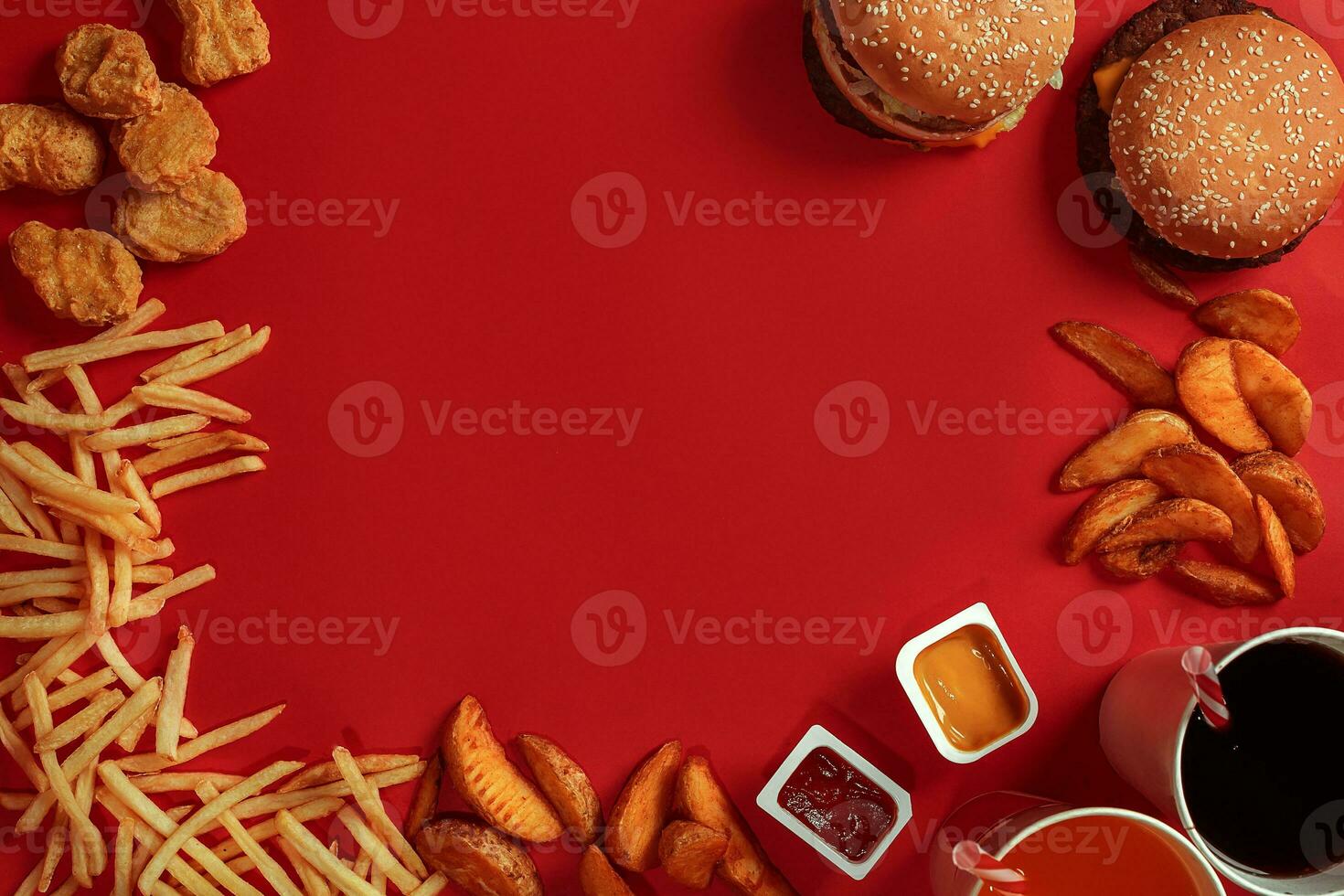 Burger and Chips. Hamburger and french fries in red paper box. Fast food on red background. photo