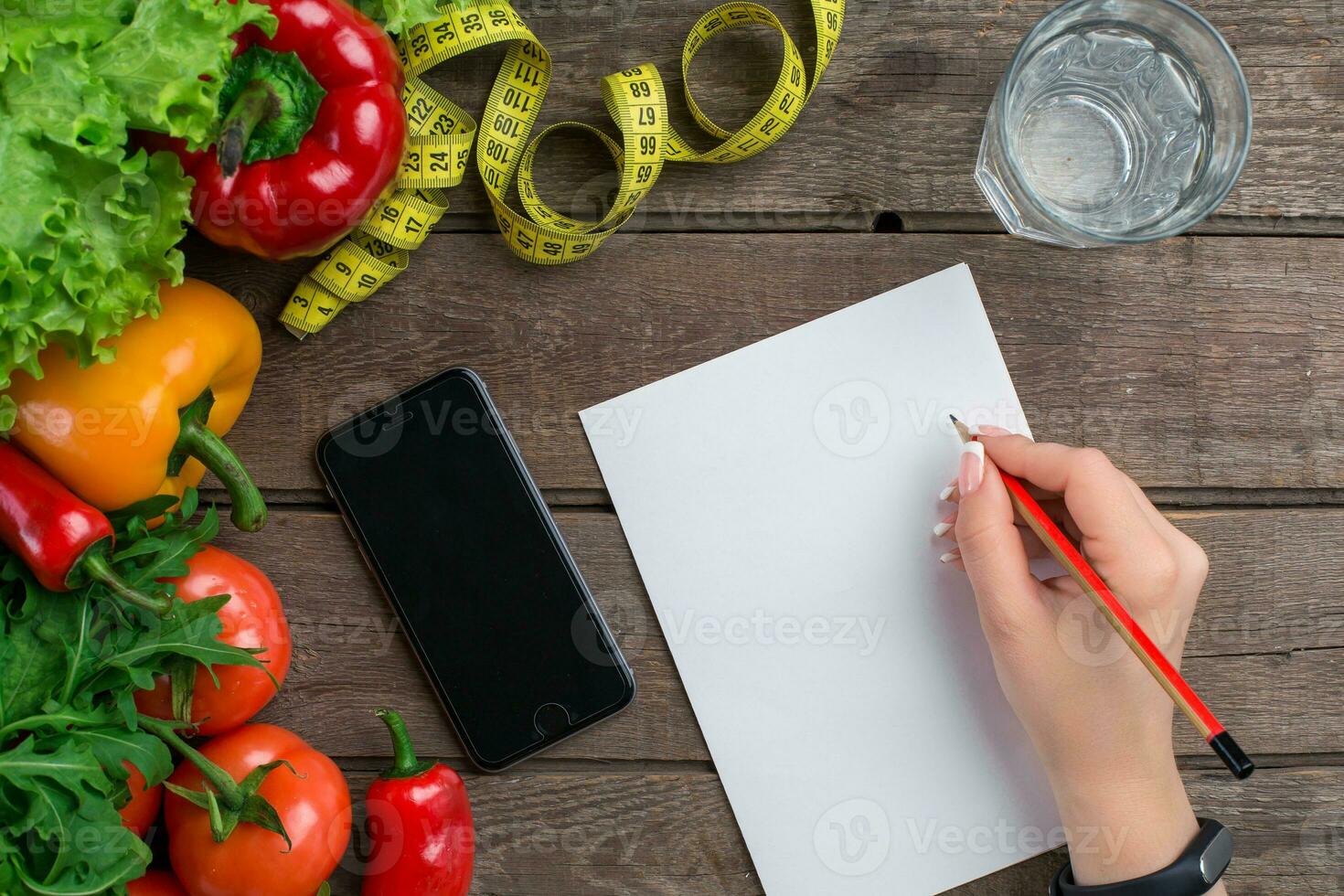 Concept diet, slimming plan with vegetables top view mock up photo