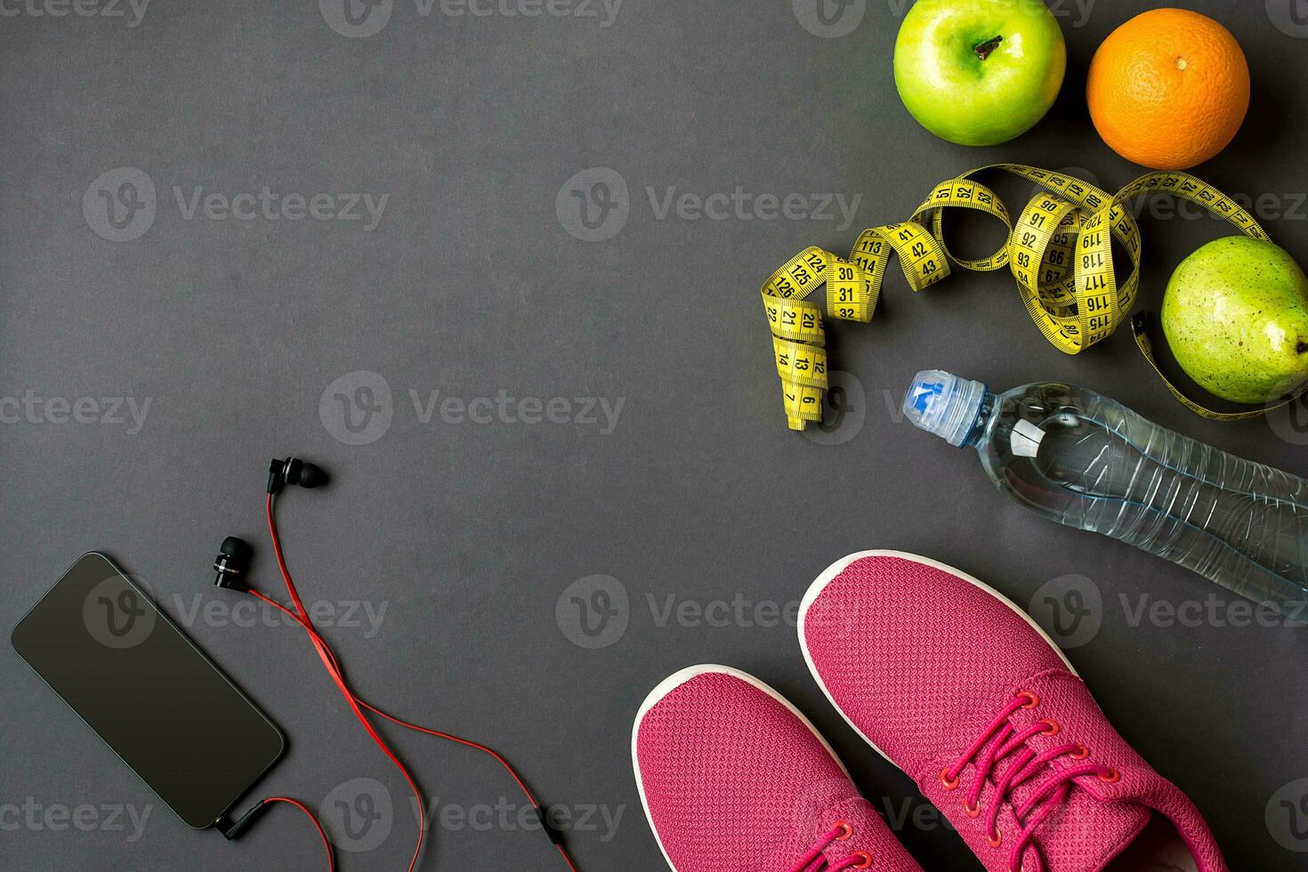Workout plan with fitness food and equipment on gray background, top view photo