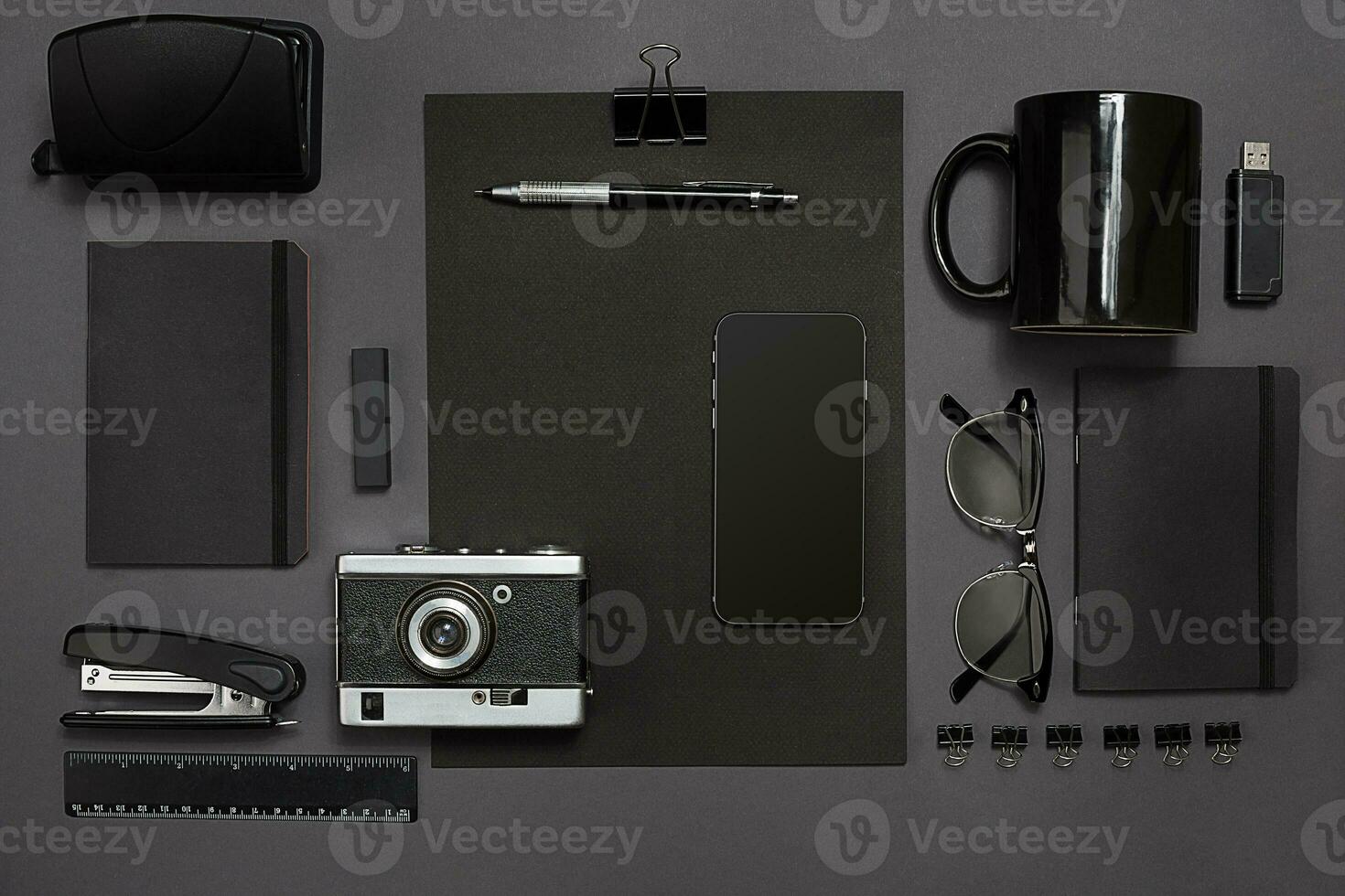 Workplace with office items and business elements on a desk. Concept for branding. Top view. photo