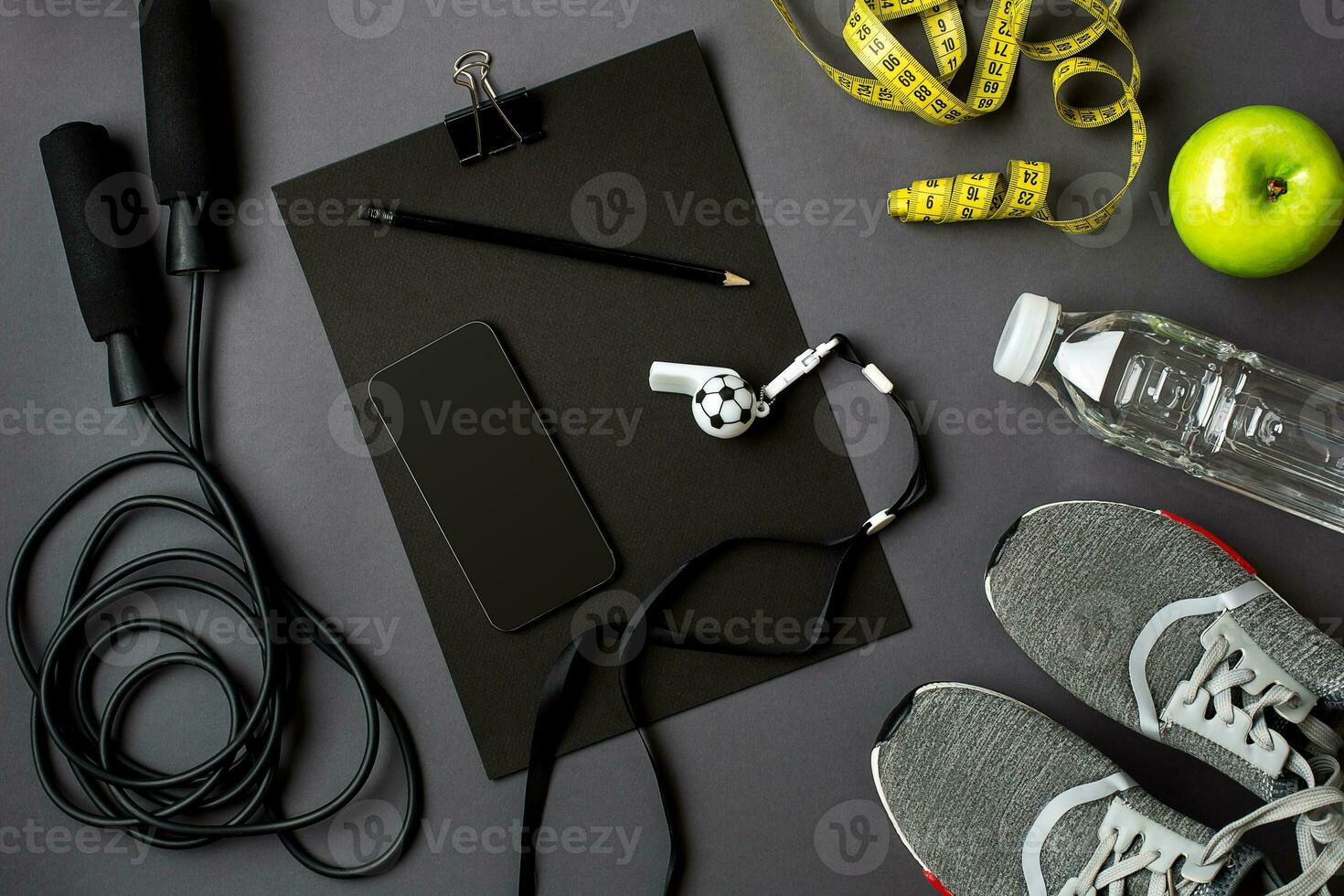 Workout plan with fitness food and equipment on gray background, top view photo