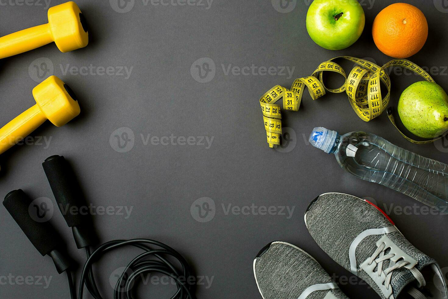 Workout plan with fitness food and equipment on gray background, top view photo