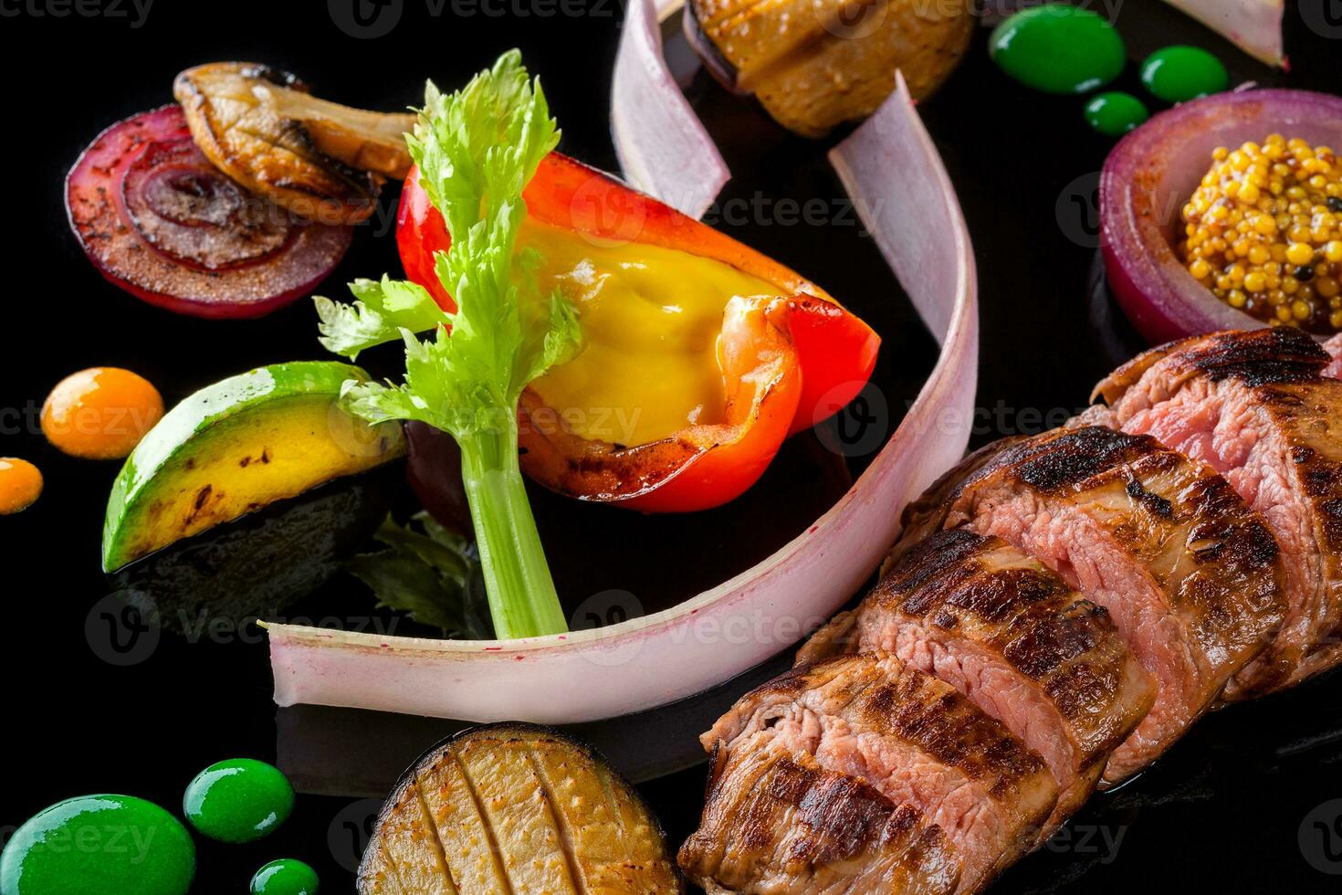 Sliced meat with fresh herbs, vegetables and spices on black background, top view photo