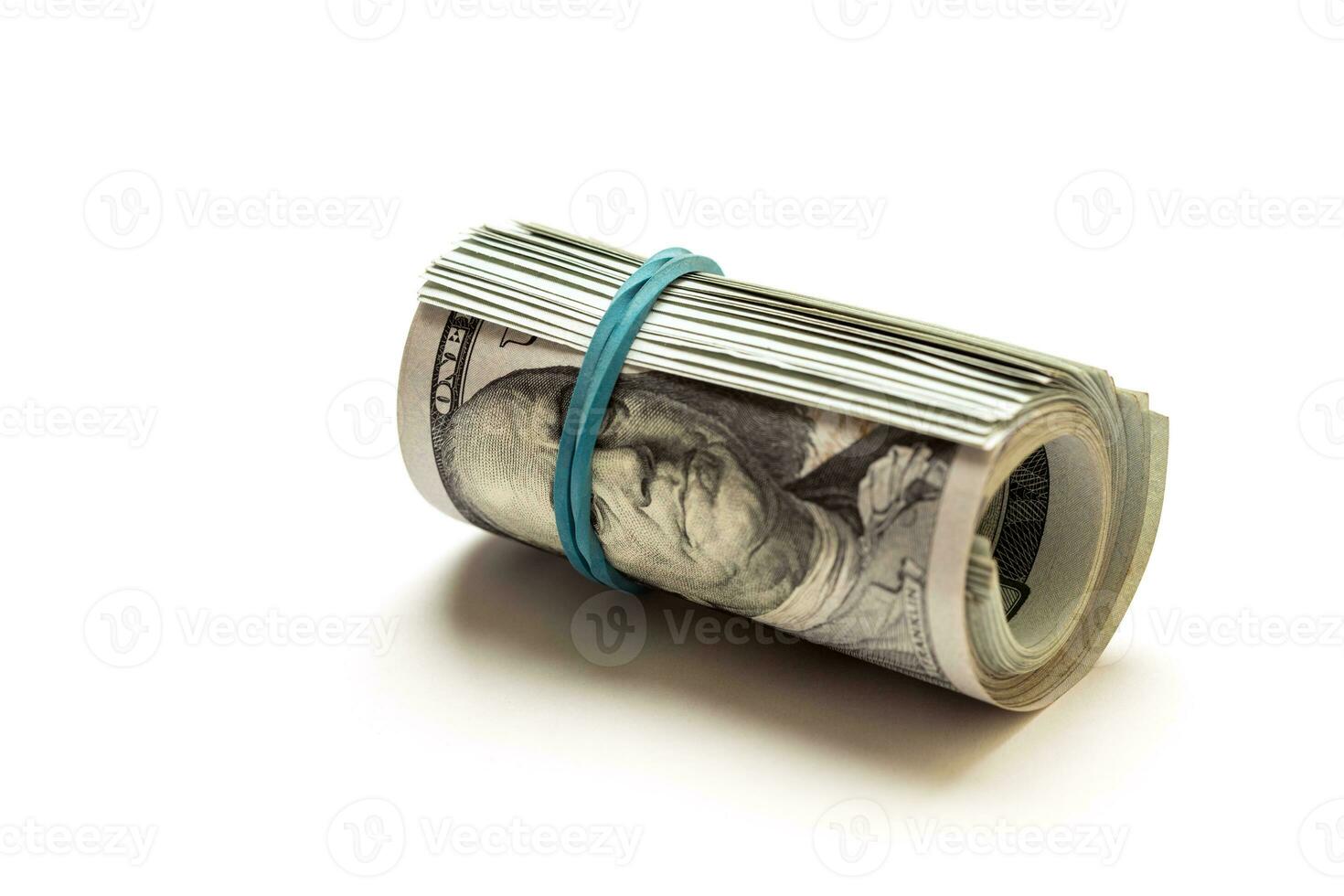 A coiled 100 dollar bill isolated on white background photo