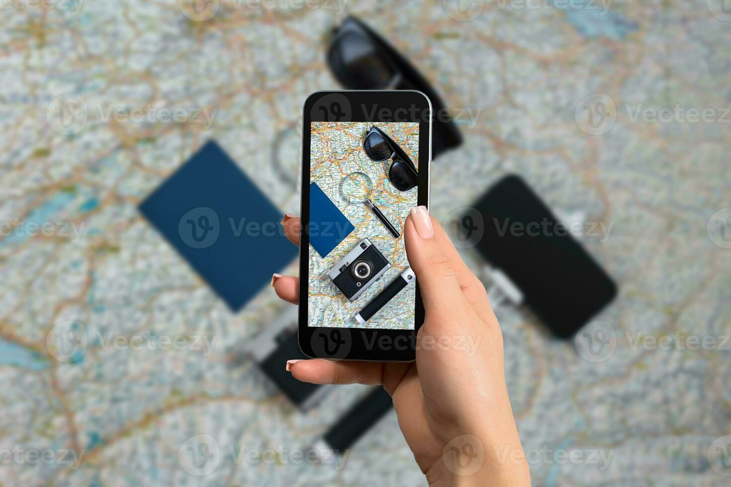 Composition with smartphone, passports and tickets on world map background. The photo is taken with telephone