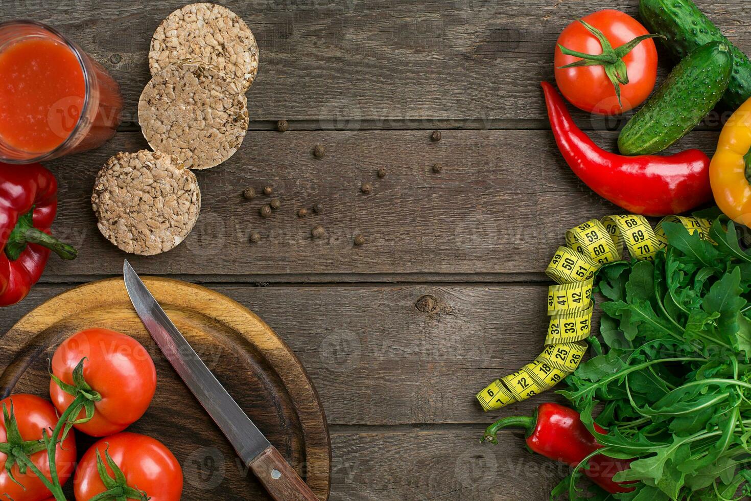Fitness concept with vegetables. Fitness motivation with centimeter. Fitness motive. Pepper. photo