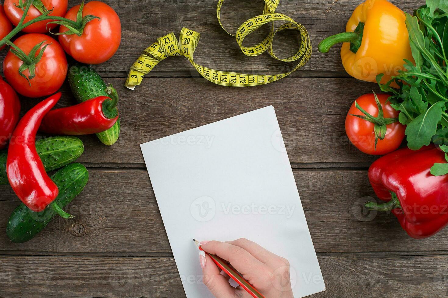 Concept diet, slimming plan with vegetables top view mock up photo