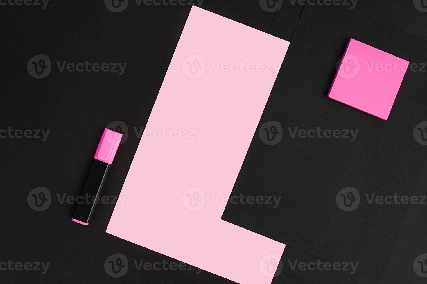 Top view of office supplies on blackboard background with copy space. photo