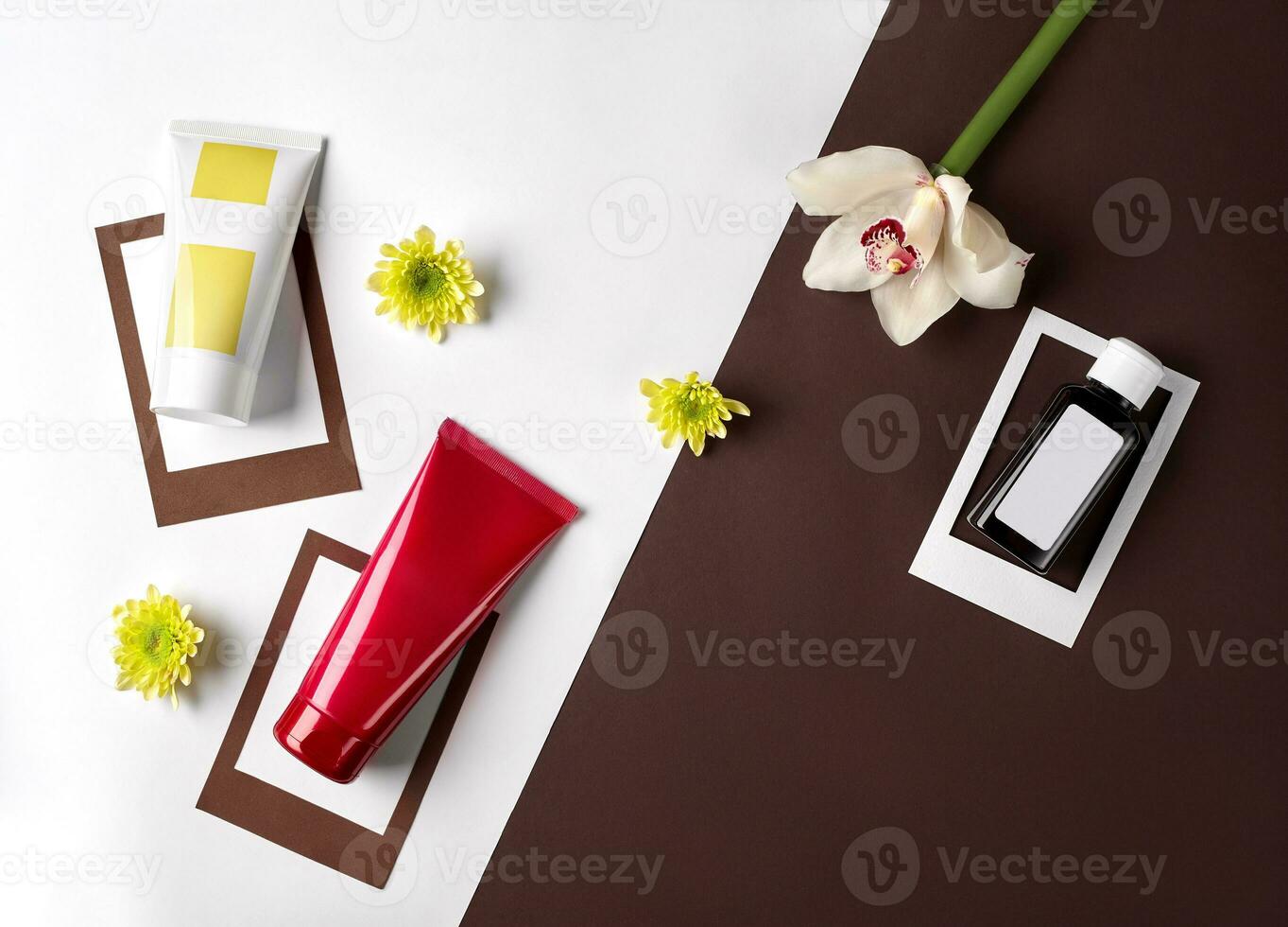 Two cosmetic tubes and plastic bottle with branding area, orchid and chrysanthemum buds against colorful studio background. Close up, copy space photo