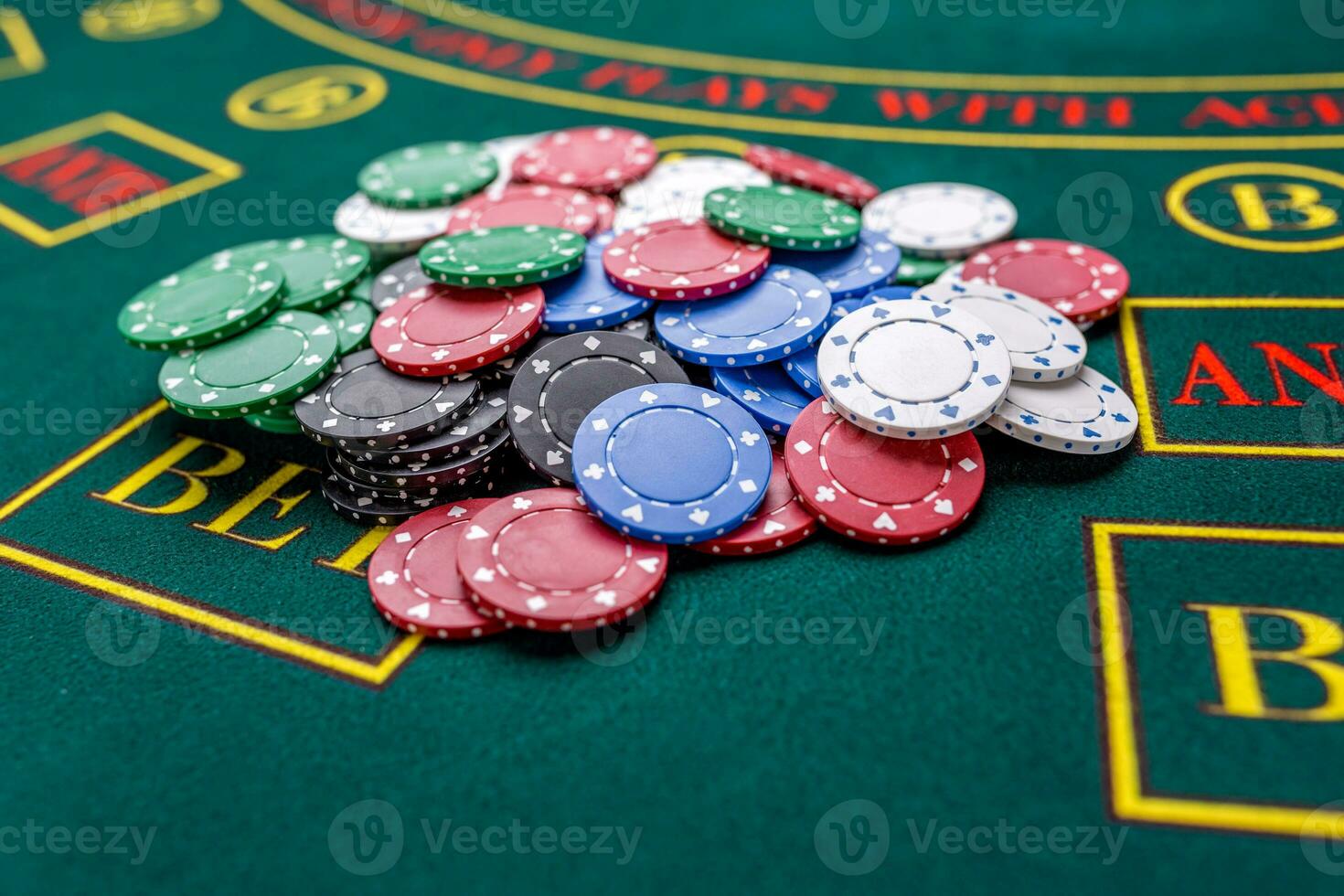 Poker chips on a table at the casino photo