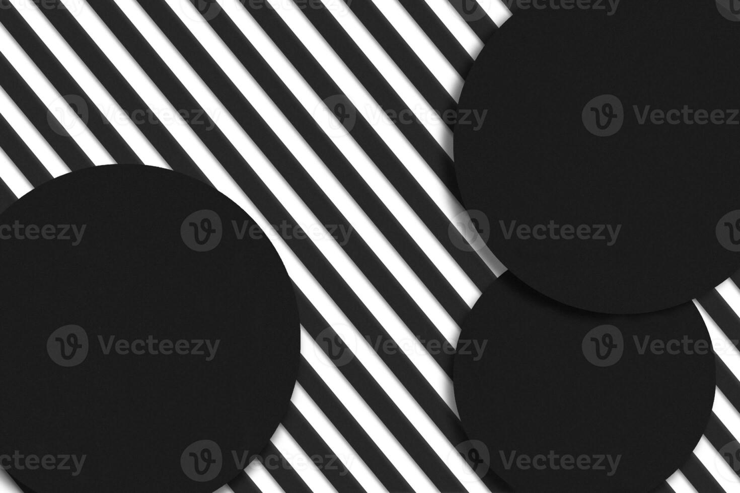 Black and white striped background with three round stands for promotional items. Close up, copy space for your advertising or products photo