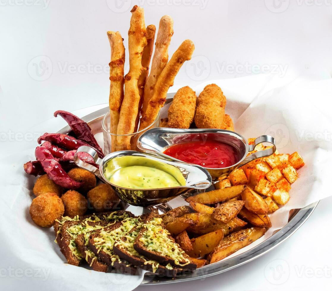 Large plate a wide selection snacks for beer served photo