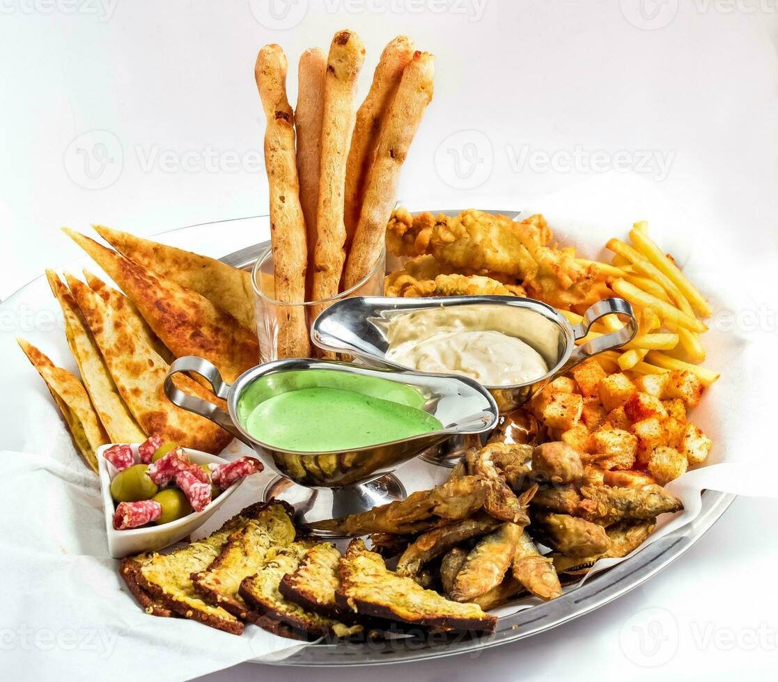 Large plate a wide selection snacks for beer served photo