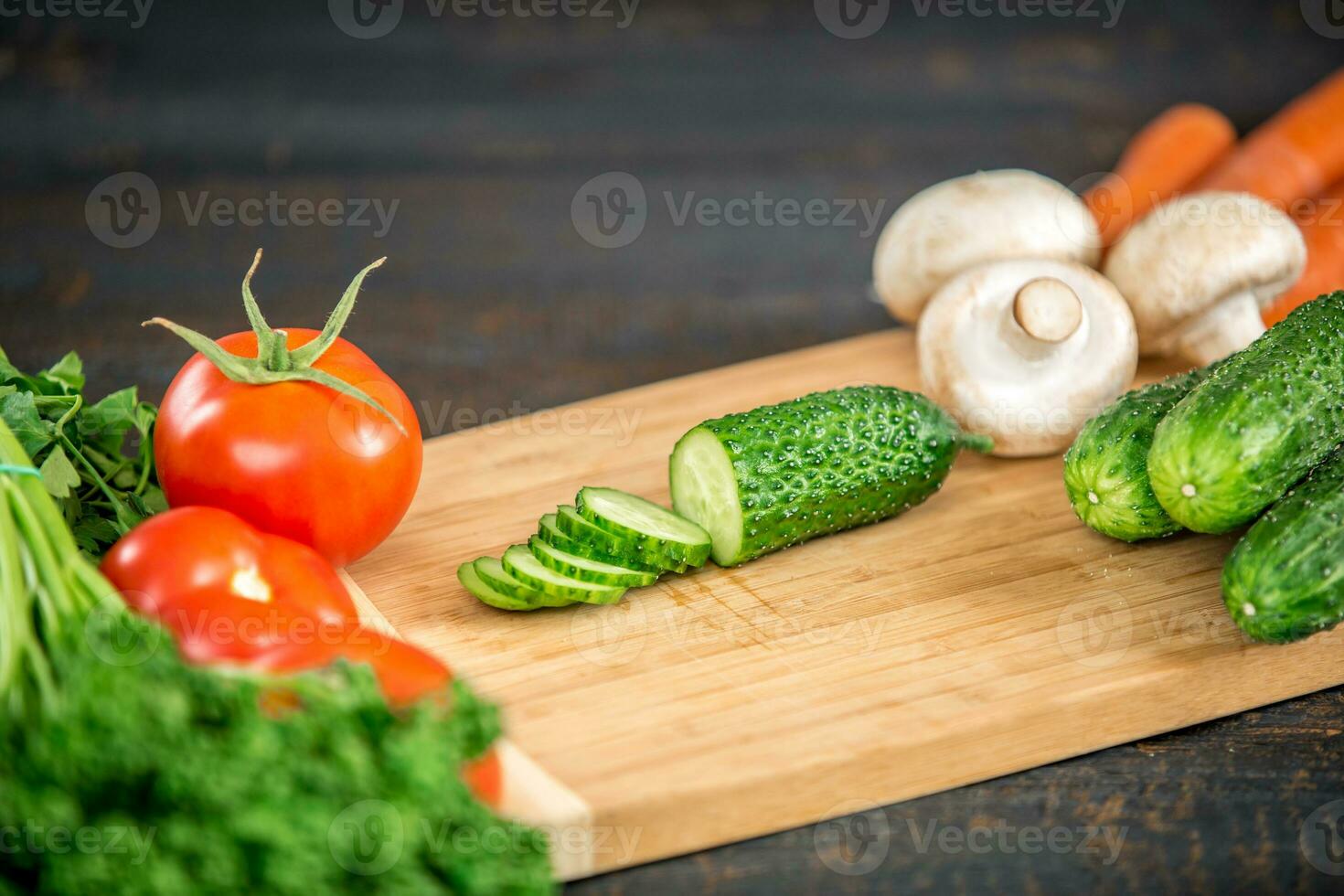 cutting vegetables for salad photo