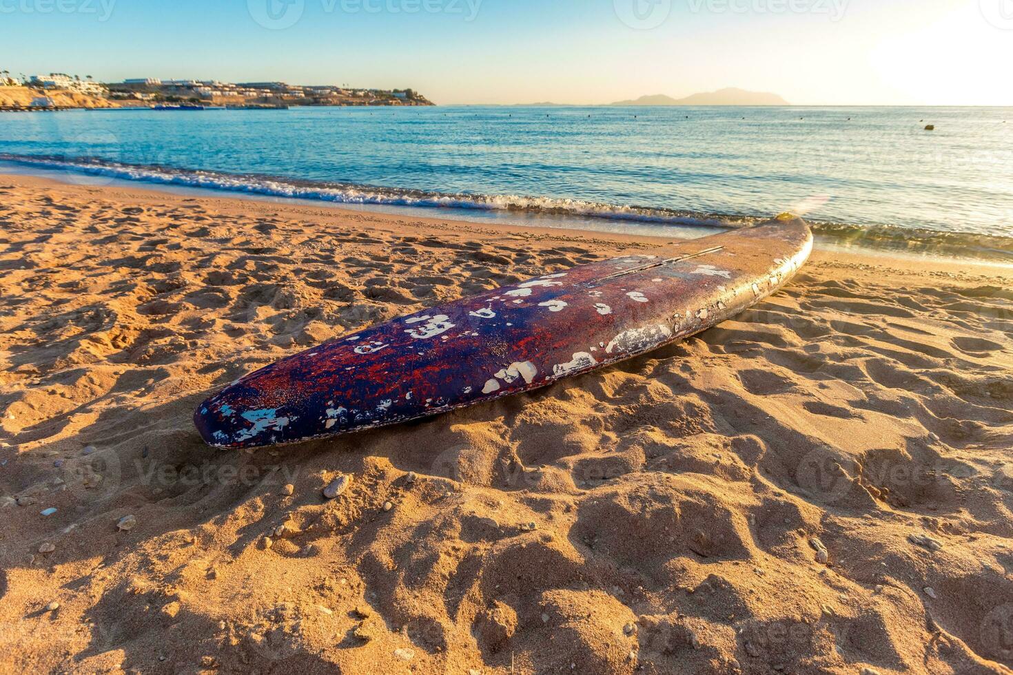 Beach coast with float in the Red Sea during sunrise. photo