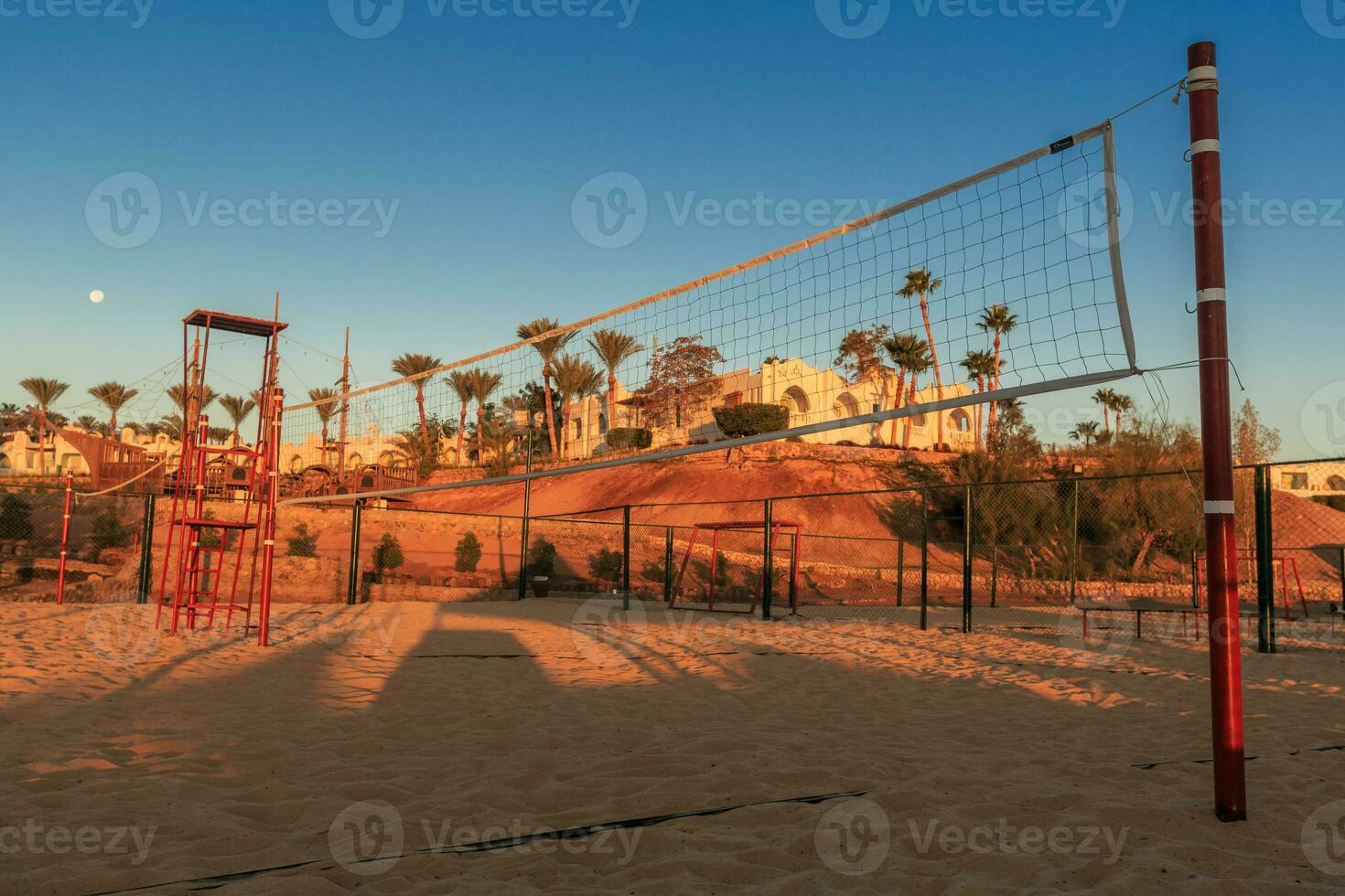 Volleyball net in the morning on beach photo