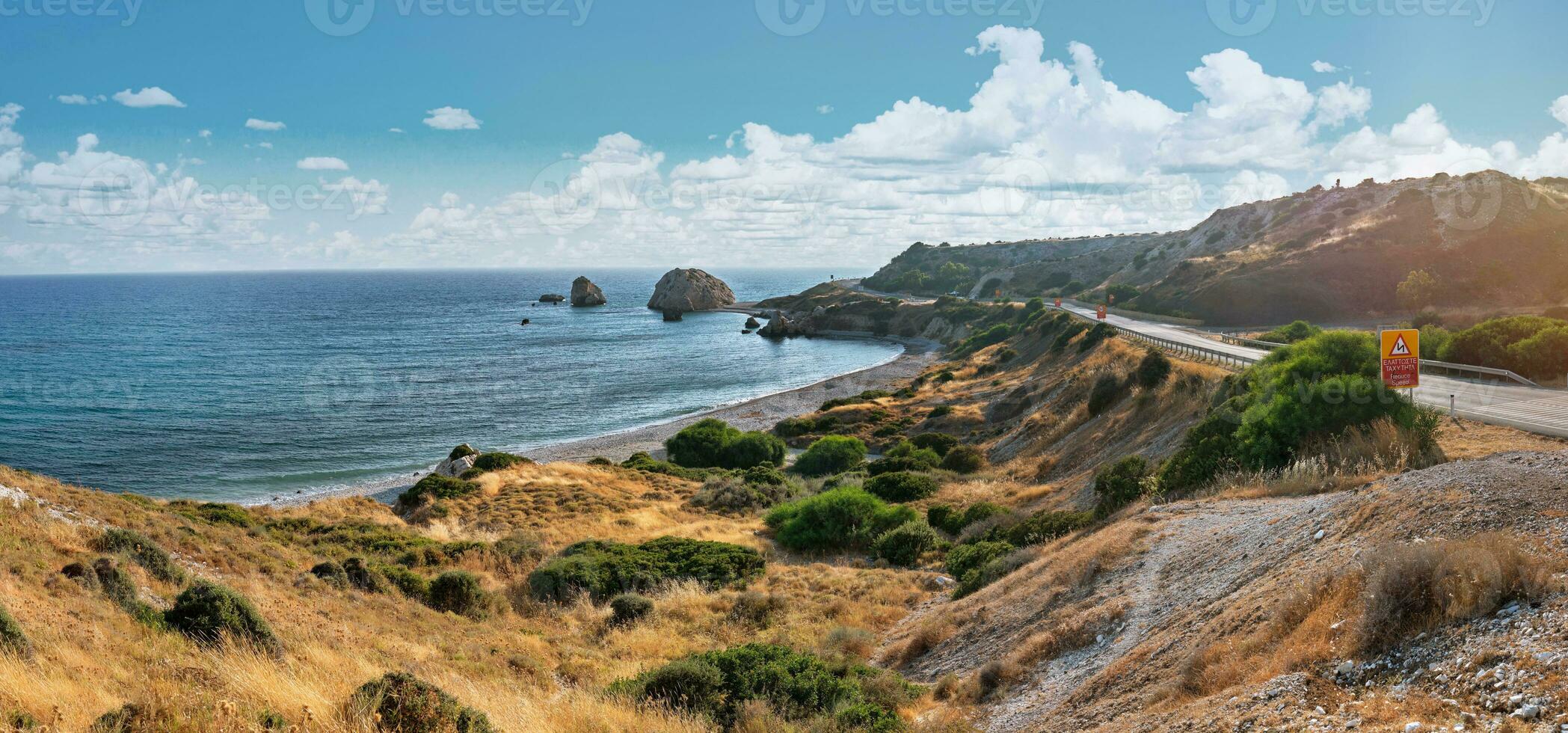 Panoramic shot of the coast of Aphrodite's birthplace near Paphos city, Cyprus. A popular holiday destination. Tourism, vacation, traveling concept. photo