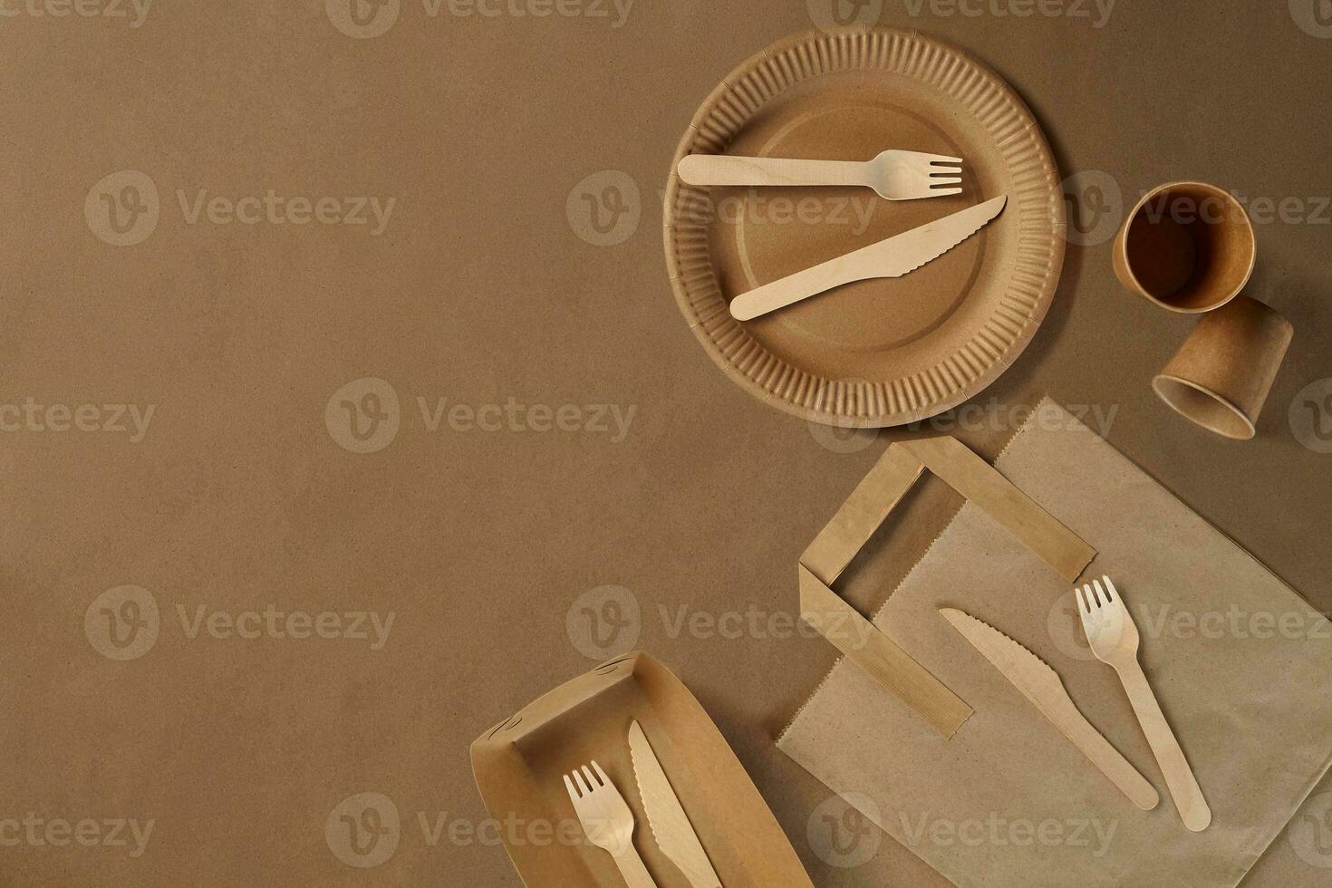 Eco friendly disposable tableware. Biodegradable craft dishes. Recycling concept. Also used in fast food, restaurants, takeaways, picnics. Close-up. photo