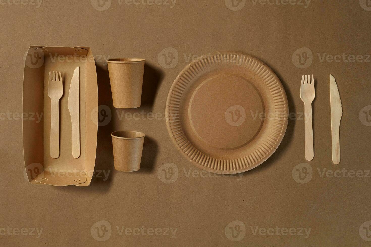 Eco friendly disposable tableware. Biodegradable craft dishes. Recycling concept. Also used in fast food, restaurants, takeaways, picnics. Close-up. photo