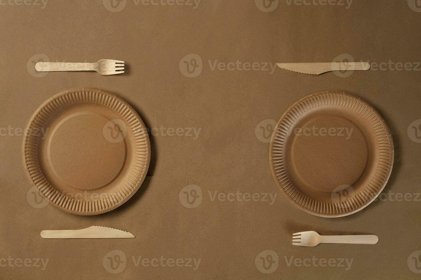 Eco friendly disposable tableware. Biodegradable craft dishes. Recycling concept. Also used in fast food, restaurants, takeaways, picnics. Close-up. photo