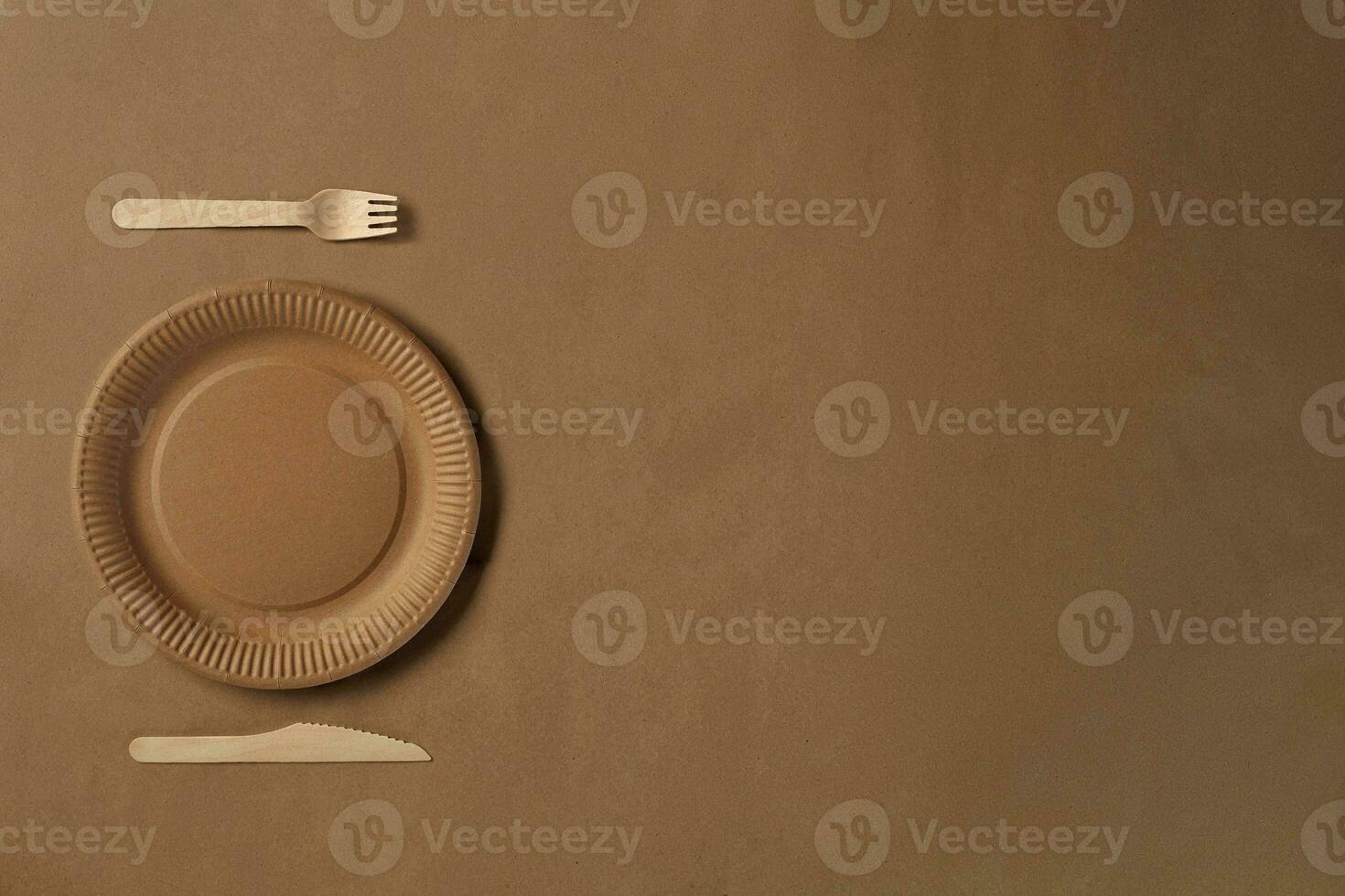 Eco friendly disposable tableware. Biodegradable craft dishes. Recycling concept. Also used in fast food, restaurants, takeaways, picnics. Close-up. photo